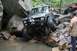 1984 Ford Bronco II - This modified 1983 Ford Bronco II is navigating a challenging rocky terrain with water obstacles.