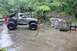 1984 Ford Bronco II - This heavily modified 1984 Ford Bronco II is shown off-roading through a rocky stream.