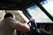 1984 Ford Bronco II - Driver navigates a rocky, wooded trail from inside a vehicle equipped with a roll cage.