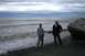 1990 Chevrolet Suburban - A cloudy day at Captain Cook State Park with two individuals enjoying the ocean view.