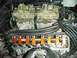 1968 Mercury Cougar - Close-up view of a V8 engine dual carburetors and prominent orange valve train components.
