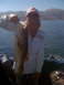 1992 Tracker Pro - A woman proudly displays a large fish she caught while on a boat trip.