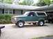 1989 Ford Bronco - This 1989 Ford Bronco is seen in a driveway with a house in the background.