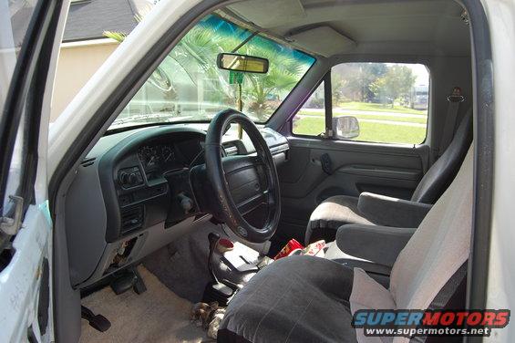 1994 Ford Bronco interior, gray seats, dashboard, steering wheel