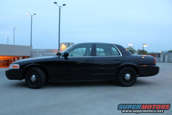 2007 Ford Crown Victoria sedan, side view, parked outdoors