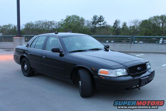 Black 2007 Ford Crown Victoria sedan, 3/4 front view