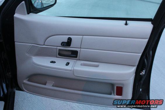 2007 Ford Crown Victoria interior door panel with power window controls