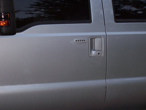 Silver 2008 Ford F-250 door with keypad entry and chrome handle