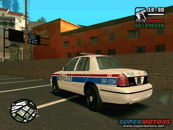 White police car with red and blue stripes, license plate 266-1234, parked on asphalt