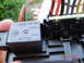 2006 Chevrolet TrailBlazer - A damaged electrical connector shows a burnt wire, indicating a potential electrical issue within the vehicle's system.