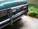 1989 Ford Bronco - Front view of a green 1989 Ford Bronco, its chrome bumper and grille.