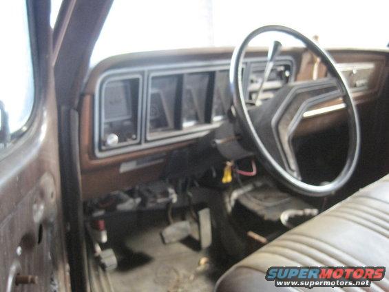 1979 Ford Bronco interior showing dashboard, steering wheel, and seats