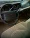 1995 Mercury Grand Marquis - Interior view of a 1995 Mercury Grand Marquis, showing the dashboard, steering wheel, and passenger seat.