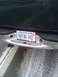 2005 Ford F-250 - Kansas license plate KCØLBD is mounted on the rear bumper of a truck.