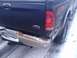 2005 Ford F-250 - The rear of a Ford F-250 Super Duty pickup truck is shown in a snowy environment. The truck has FX4 Off Road badging.