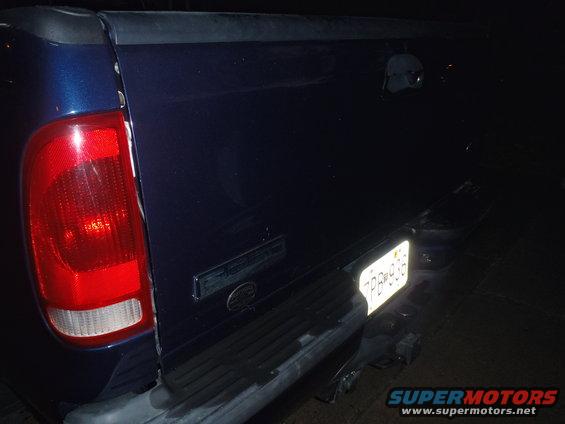 2005 Ford F-250 tailgate with license plate 7PB-936 visible