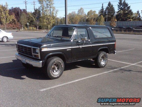 Black 1985 Ford Bronco parked in a lot