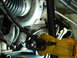 2004 Mercury Marauder - A close-up view of a turbocharger and associated engine components, including hoses and wiring.