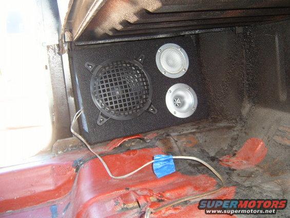 Speaker box with two tweeters and one woofer installed in a red truck bed