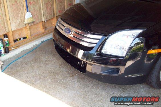 Black 2006 Ford Fusion front end with chrome grille and headlights