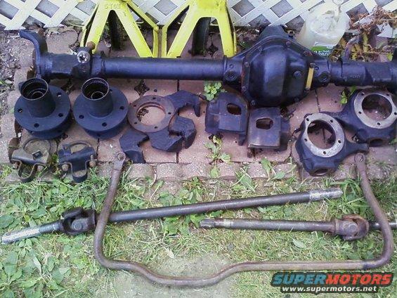 dana-44-parts.jpg Spindles, hubs, rotors, calipers, and brake mounting brackets.