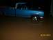 1974 Dodge 1500 - A blue pickup truck sits in murky floodwaters, with the date 05/03/2010 visible in the corner.