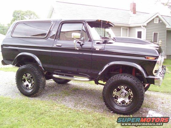 Black 1978 Ford Bronco with lifted suspension and custom wheels