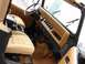 1979 Jeep CJ7 - Interior view of a 1979 Jeep CJ7, highlighting its tan upholstery and dashboard layout.
