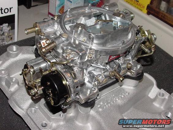 mvc094f.jpg 2009. Edelbrock 4bbl and manifold with emissions provisions. Installed and running like a dream!