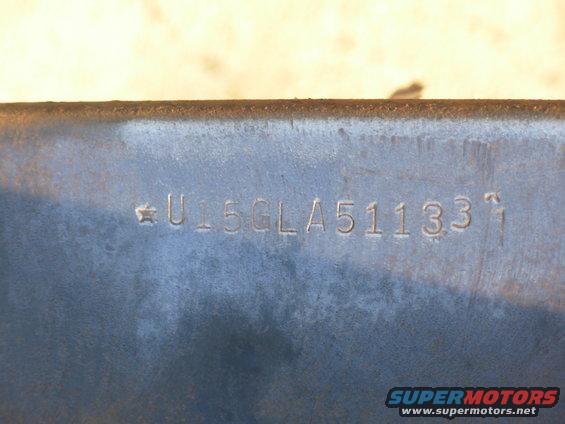 frame00eb.jpg This is on the passenger side between the shock tower & the footwell body mount.  Refer to the diagram linked below.
U15GLA511331(?)

Oct75
http://www.broncohio.com/tech/ebvins.html
[url=http://www.supermotors.net/registry/media/876772][img]http://www.supermotors.net/getfile/876772/thumbnail/ebframexdims.jpg[/img][/url]