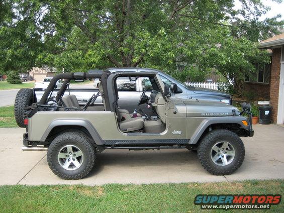 2005 Jeep Wrangler Rubicon, tan, soft top removed, side view