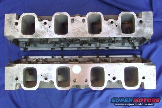 Pair of aluminum V8 engine cylinder heads, possibly Ford