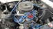 1964 Ford Fairlane - Engine bay details, including blue spark plug wires and an Edelbrock air cleaner, are visible.