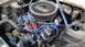 1964 Ford Fairlane - Close-up view of a V8 engine bay, aftermarket performance parts.