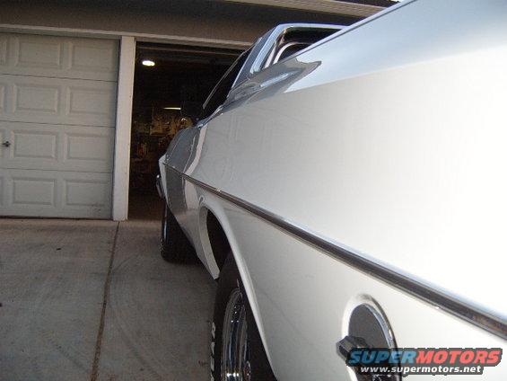 1973 Ford Ranchero parked in front of a garage, side view