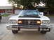 1973 Ford Ranchero - This vehicle has a prominent grille and dual headlights, with amber turn signals.