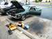 1968 Mercury Cougar - Green 1968 Mercury Cougar with hood and door open, parked next to a Jeep. Tools and fluids are on the ground.