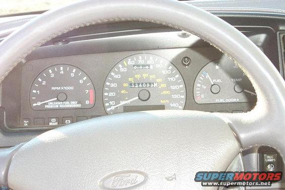 1993 Ford Taurus interior dashboard with odometer showing 124093 miles