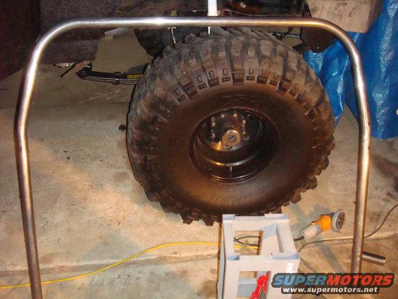 Roll cage frame over large off-road tire