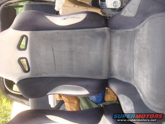 Interior seats with dark upholstery and light grey accents