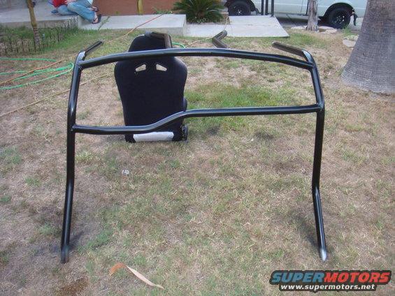 roll cage and racing seat on grass