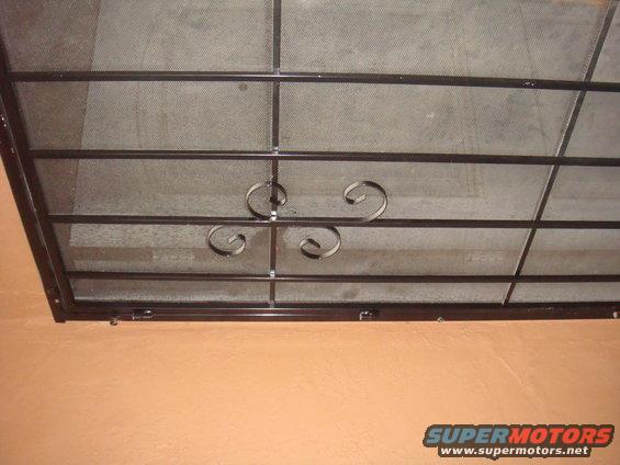 Window security bars with decorative scrollwork