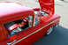 1959 Ford Ranchero - This red 1959 Ford Ranchero features a custom interior and a clean engine bay with the hood up.