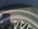1993 Lincoln Town Car - A tire and wheel assembly is shown, with visible text on the tire's sidewall.