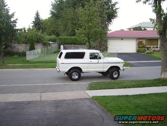 White 1978 Ford Bronco parked on a suburban street, side view