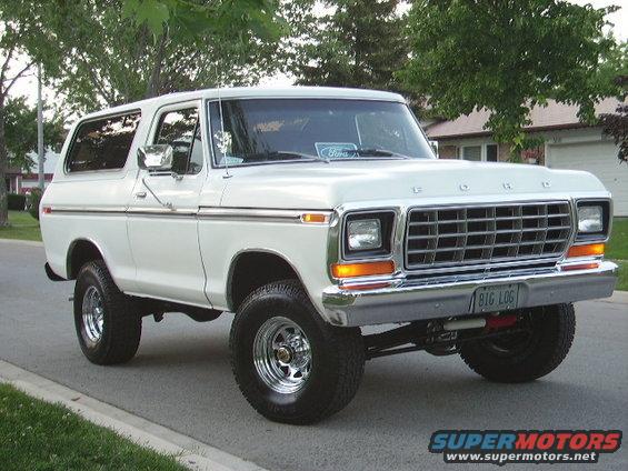White 1978 Ford Bronco parked on a residential street