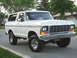 1978 Ford Bronco - This 1978 Ford Bronco features a chrome grille and a custom license plate reading 'BIG LOG'.