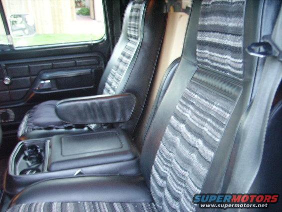 1978 Ford Bronco interior with plaid seat inserts and center console