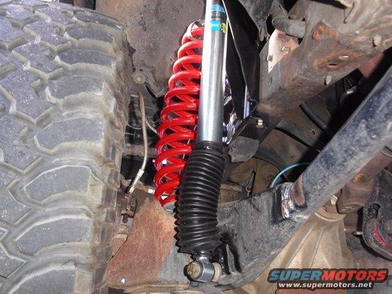 shock.jpg Front shock mount setup.
The Bilsteins have been replaced with Fox 2.0s (Fox allows you to change the shock's valving). 