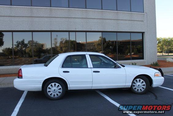 White 2003 Ford Crown Victoria side view